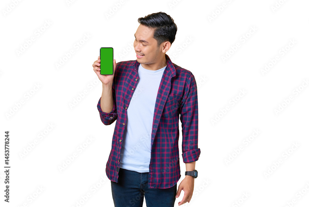 Smiling young Asian man in plaid shirt showing blank screen smartphone isolated on transparent background Smiling young Asian man in plaid shirt showing blank screen smartphone isolated on transparent background