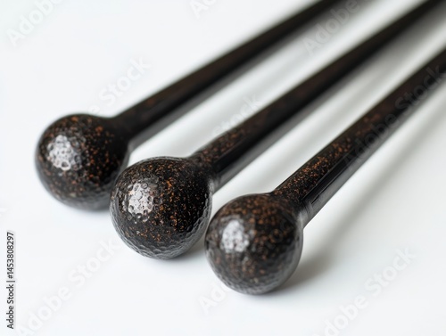 Obraz na płótnie Four wooden baking sticks with a speckled texture. w salonie