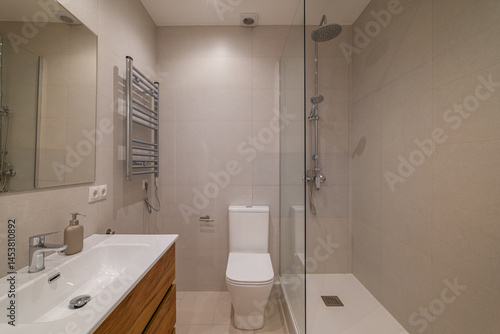 Wallpaper Mural Bathroom with wood vanity, wall-mounted mirror, chrome towel warmer and glass shower enclosure Torontodigital.ca