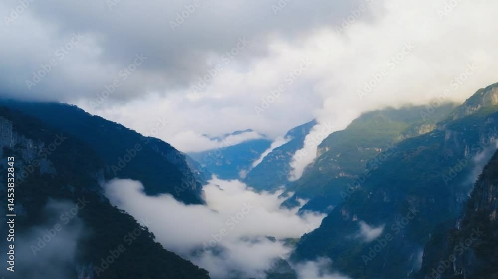 Misty Mountain Valley: Clouds embrace the peaks of a majestic mountain range, creating an ethereal landscape of mist-shrouded valleys and towering summits. Misty Mountain Valley: Clouds embrace the peaks of a majestic mountain range, creating an ethereal landscape of mist-shrouded valleys and towering summits.