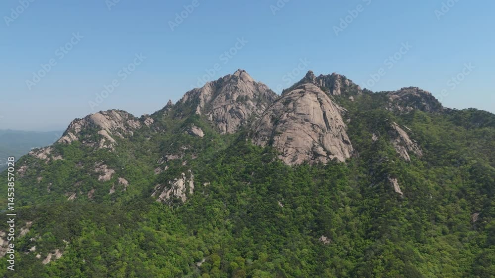 mountain peak made up of huge rock walls mountain peak made up of huge rock walls