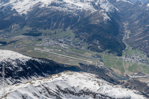 aerial landscape with Samedan and Bever villages near Engadin airport, Switzerland