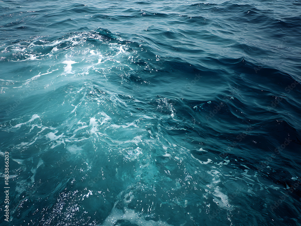 Obraz premium Calming blue sea surface with gorgeous shimmer