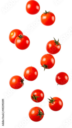 Fresh cherry tomatoes falling on transparent background
