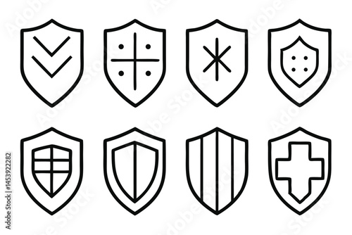 Eight uniquely shaped black and white shields stand side by side on white background