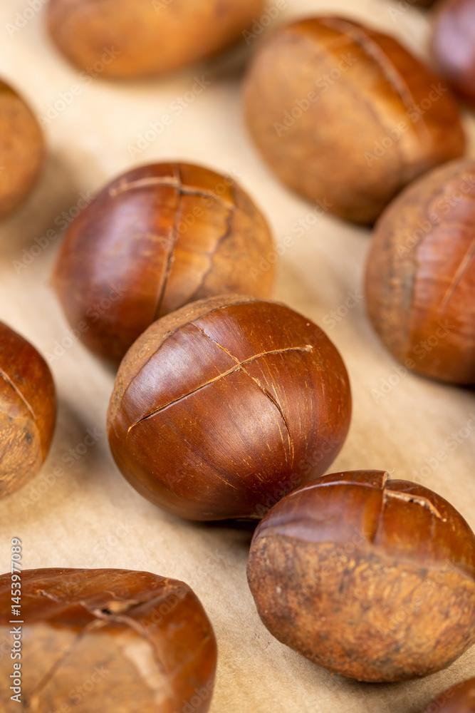 a cross incised on a chestnut shell, cutting the shells of edible chestnut nuts for baking