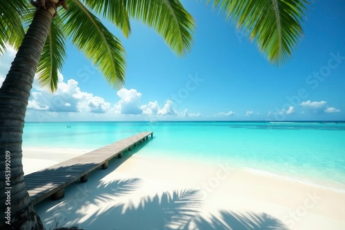 Turquoise water laps wooden pier on idyllic tropical beach , Hawaii, palm trees