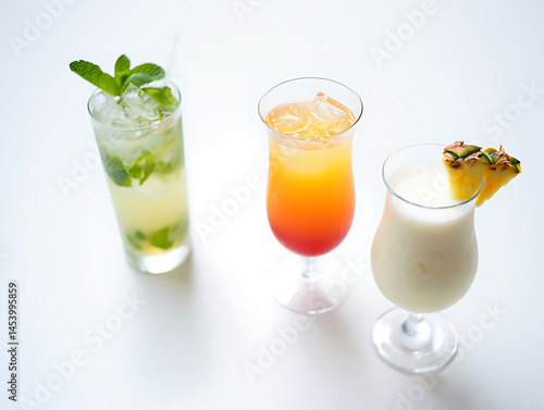 Wallpaper Mural Exotic cocktails: Mai Tai, Mojito, Piña Colada on white table Torontodigital.ca