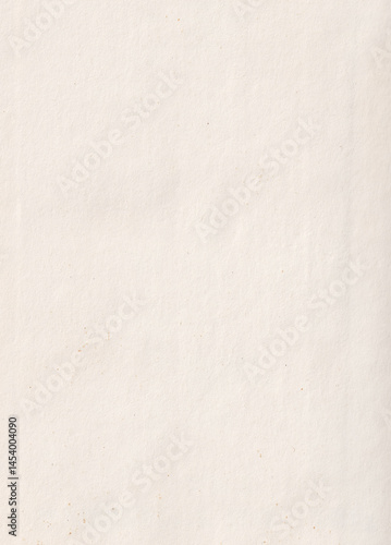 Closeup view of a textured offwhite paper surface