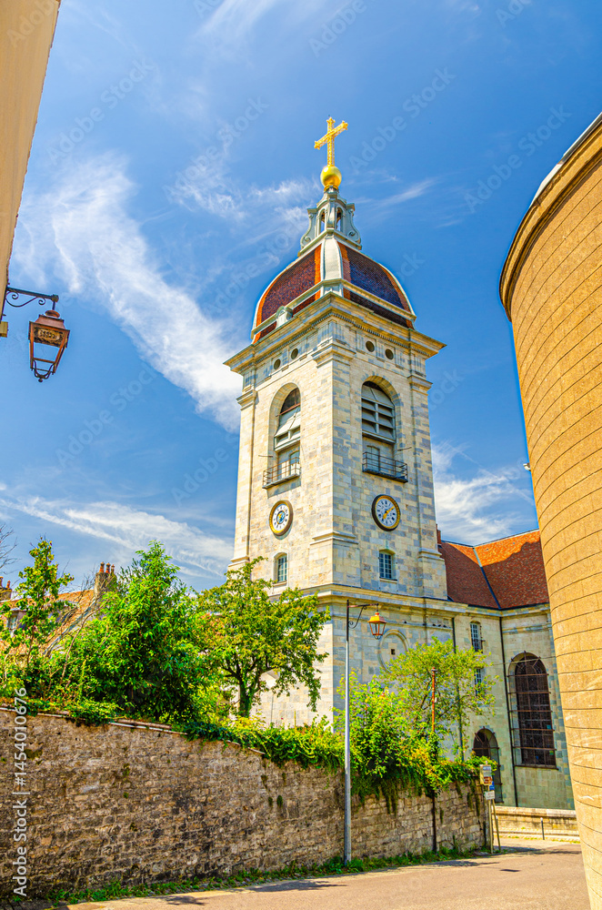 La Cathédrale Saint-Jean Cathedral tower building in Besancon old town centre ville, La boucle de Besançon city historic centre in sunny summer day, Bourgogne-Franche-Comte region, France