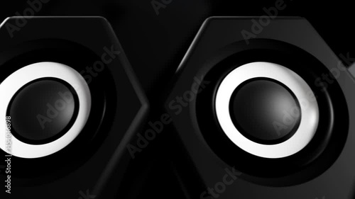 Audio speakers standing in a row, Creative dolly shot looped in Ultra HD 4K.
