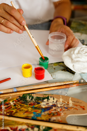 we start drawing a white sheet of paper and paints