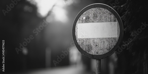 Obraz na płótnie A circular street sign with a diagonal line through it indicating a restricted or prohibited area. w salonie