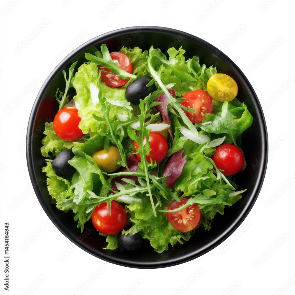 Top view of a fresh salad with tomatoes olives and lettuce in a dark bowl isolated Top view of a fresh salad with tomatoes olives and lettuce in a dark bowl isolated