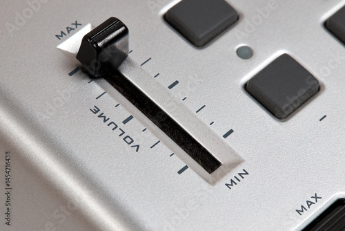 Photos Midi keyboard controller close up with faders wheel buttons and knobs pitch, band, modulation, octave max min