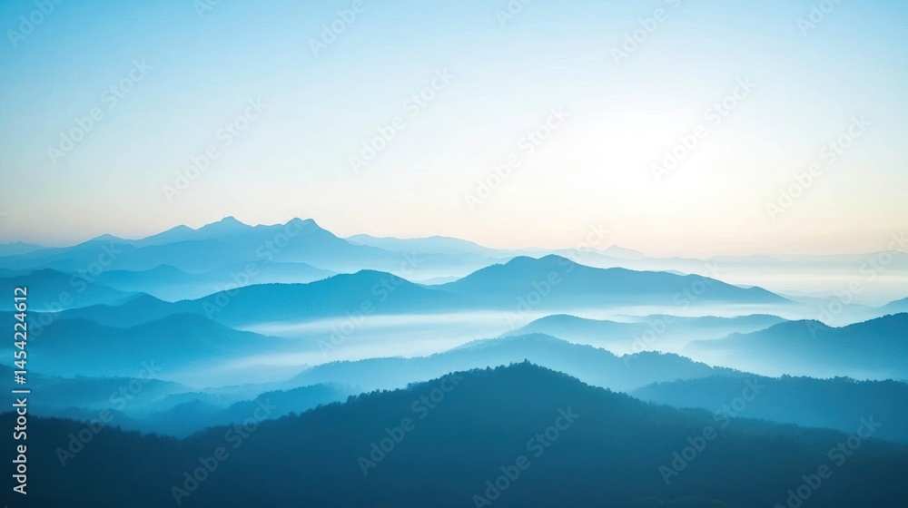 Misty mountain range at dawn Misty mountain range at dawn