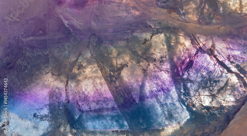 texture of fluorite macro from blue to lilac colors
