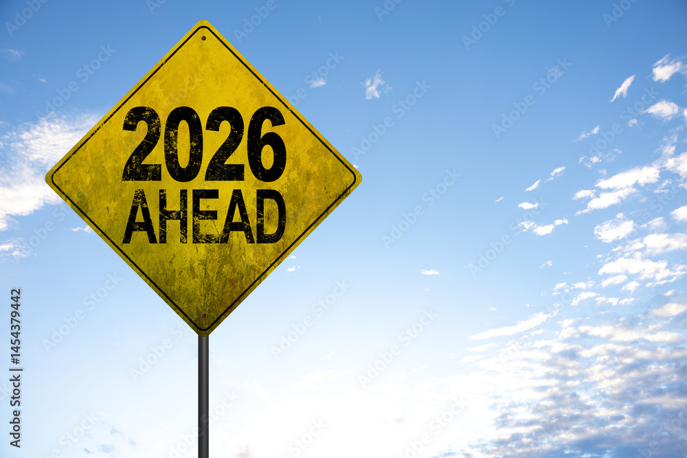 Naklejka premium 2026 new year. Night road leading to glowing 2026 sign, representing fresh beginnings, innovation, hope, and forward movement, surrounded by streetlights and atmospheric mist