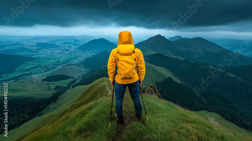 Tourist man hiker on top of the mountain. Active life concept