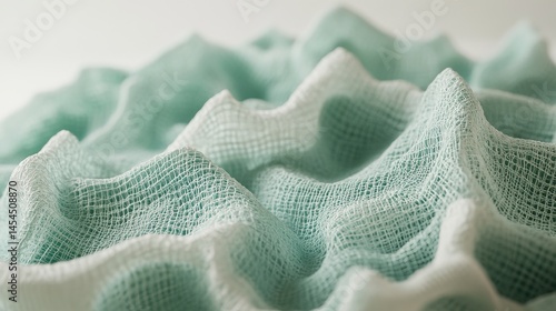 Obraz na płótnie Textured folds of light teal and white fabric. w salonie