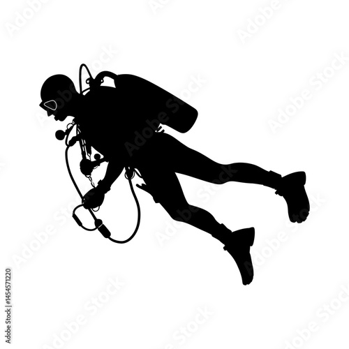 A scuba diver exploring of black silhouette