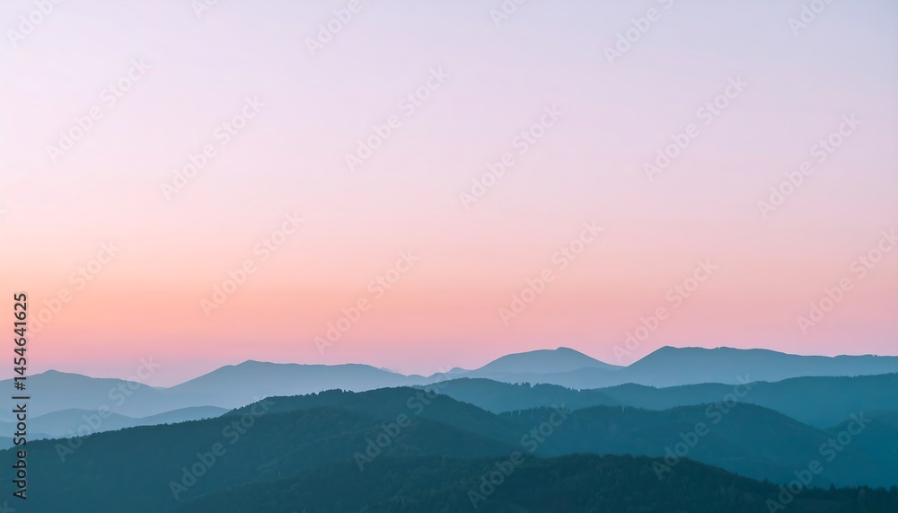 Obraz premium Serene Sunset Over Layered Mountains