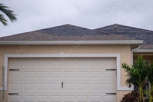 Shingles ripped off a roof