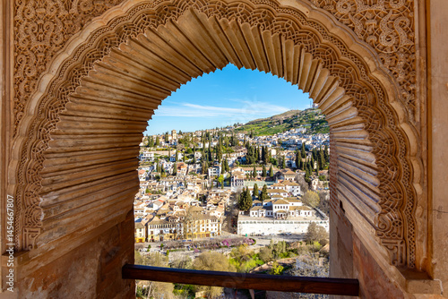 Albaicin district of Granada seen through window of Nasrid palace in Alhambra, Spain