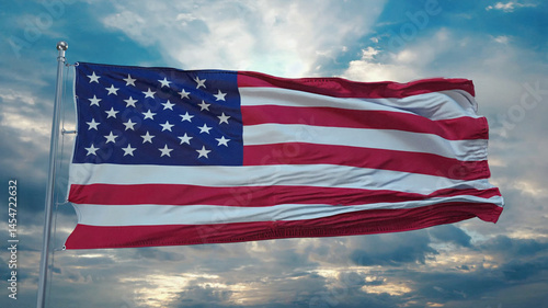 Obraz na płótnie American flag waving in the wind, symbolizing patriotism, freedom, and national pride with vibrant red, white, and blue colors.
w salonie