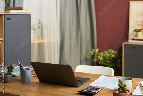 Wallpaper Mural Laptop on wooden desk in home office interior, copy space, no people Torontodigital.ca