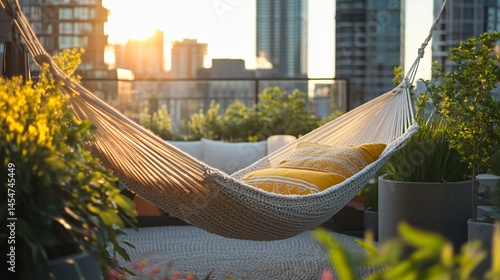 Obraz na płótnie Close up of hammock in rooftop garden with modern decor, city skyline in the soft background w salonie