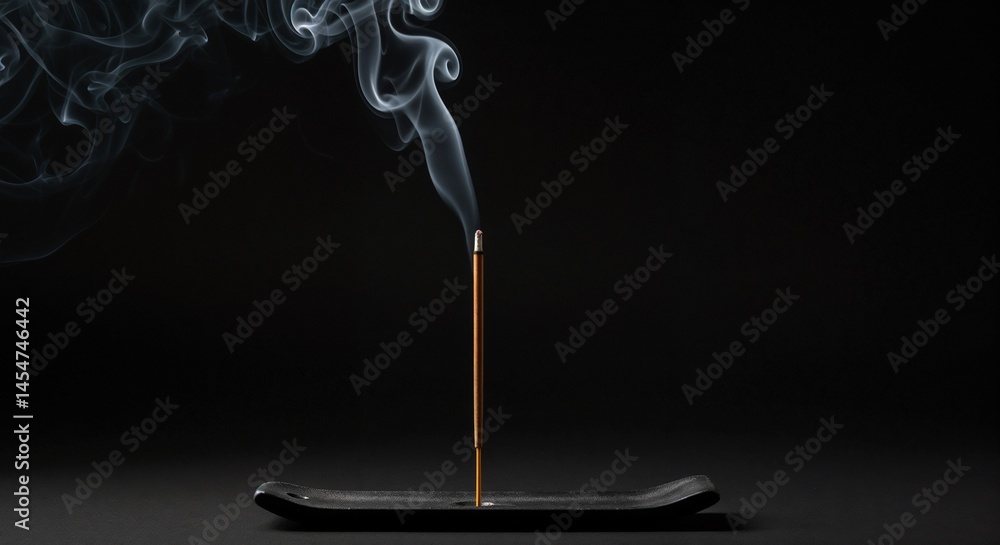 Burning incense stick producing smoke in minimalist holder on dark background, calming atmosphere