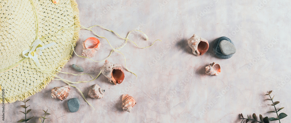 Travel background, hat, shells, stones and branches top view web banner