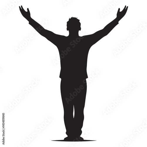 Silhouette of man with arms raised in worship and praise