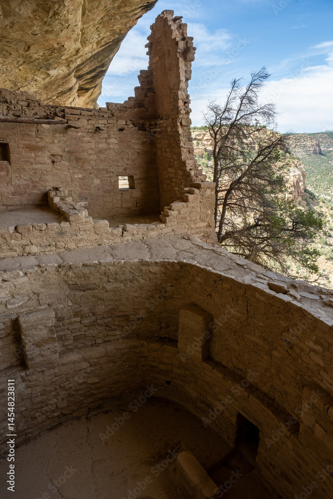 Large Kiva and Remaining Stone Wall On The Edge of Balcony House