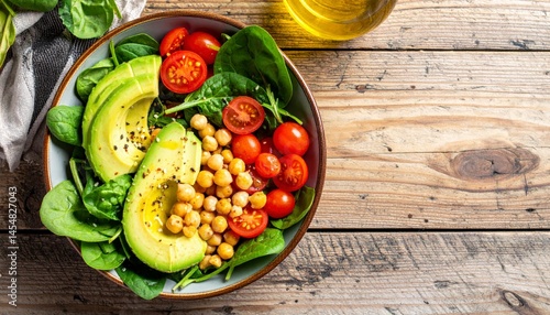 Green healthily salad on a wooden background