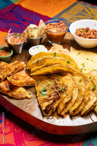 Enjoy a delicious Mexican Tacos Platter that comes complete with assorted sides and flavorful sauces