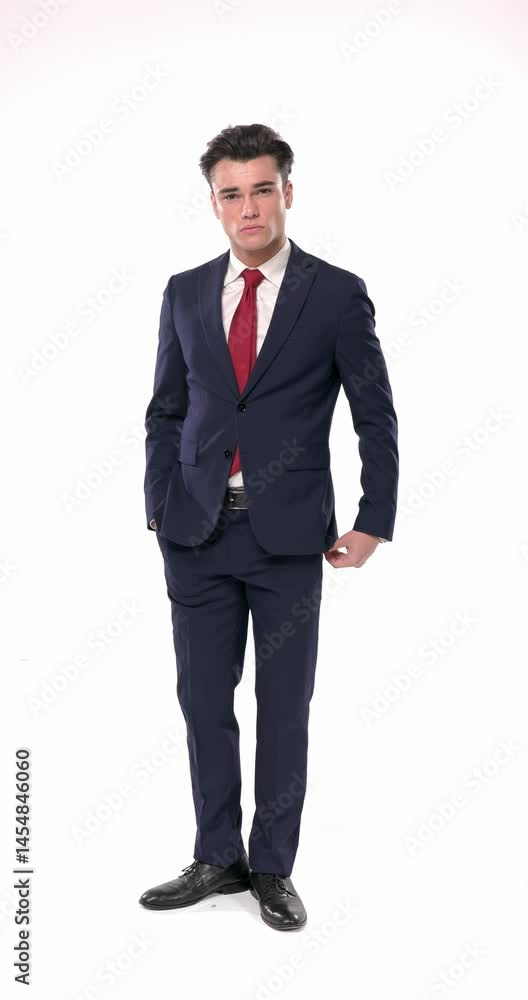 confident elegant businessman walking with hands in pockets, moving and posing, rubbing palms and looking behind, touching chin and being thoughtful confident elegant businessman walking with hands in pockets, moving and posing, rubbing palms and looking behind, touching chin and being thoughtful