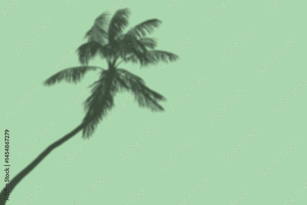 Fototapeta premium Natural palm leaves shadow on gradient paper background. Abstract blue and mint tropical backdrop. Soft light