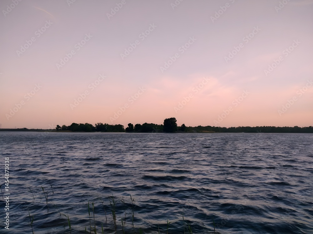 Obraz premium beautiful sunset near the pond