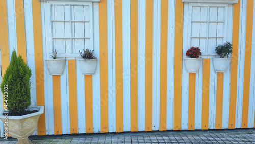 Street with colorful houses. Street with striped houses, Costa Nova, Aveiro, Portugal. Facades of colorful houses in Costa Nova, Aveiro, Portugal.