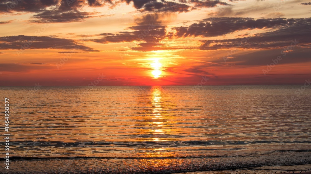 Fototapeta premium Dreamlike beach sunset with golden sunlight reflecting across calm ocean