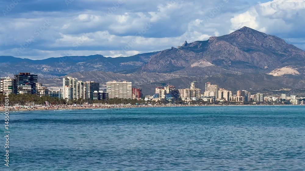 Fototapeta premium Stunning and Beautiful Coastal View Featuring Majestic Mountains in the Background