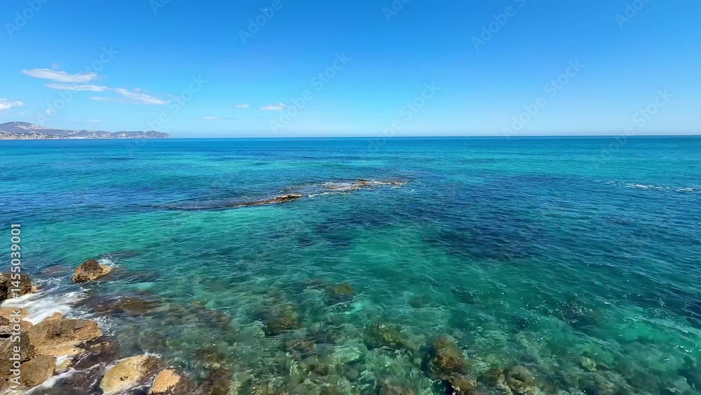 Fototapeta premium Experience Stunning Aerial Views Showcasing Turquoise Waters and Dramatic Rocky Coastline