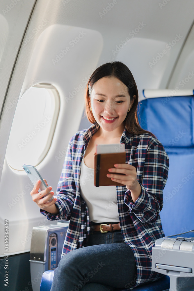 Woman on Airplane with Passport and Phone