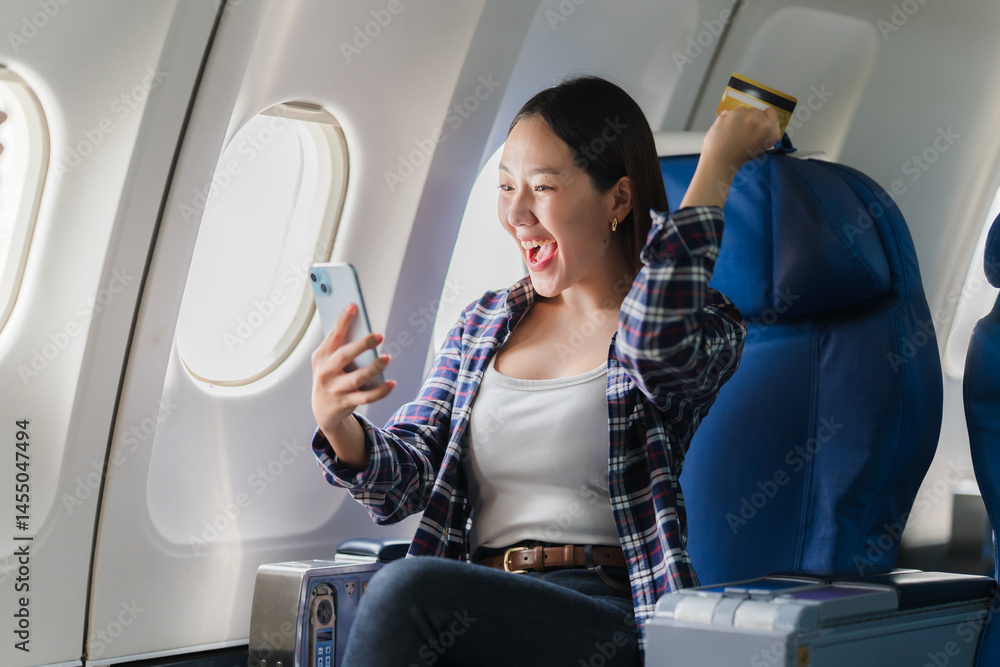 Excited Woman Booking Flight on Airplane