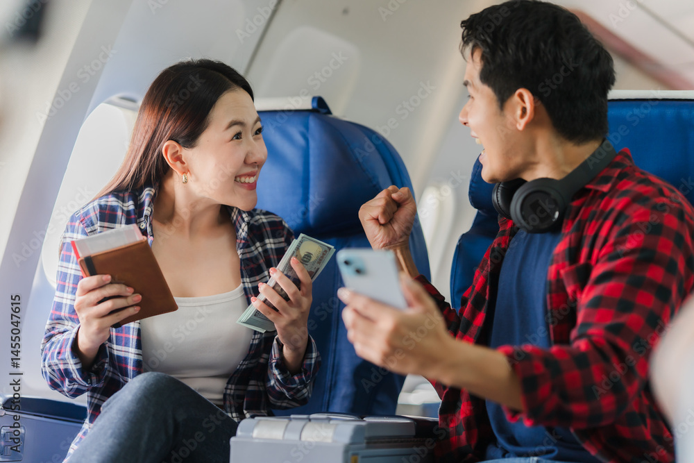 Excited Couple Traveling by Airplane