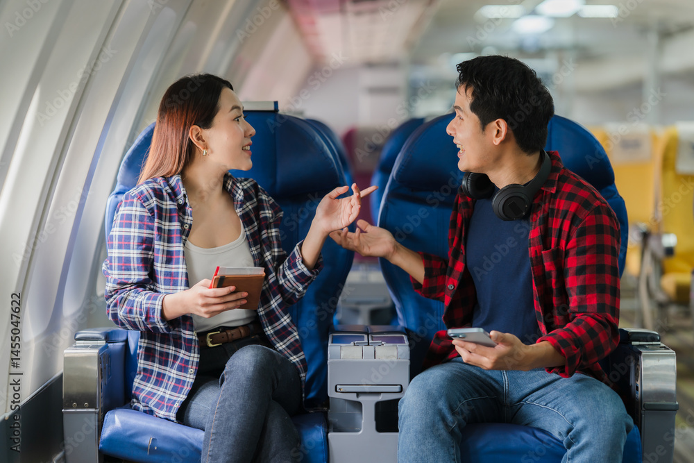 Couple Traveling by Airplane