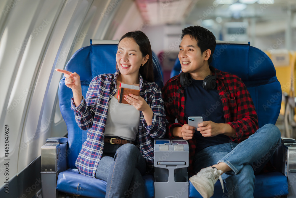 Couple Traveling by Airplane