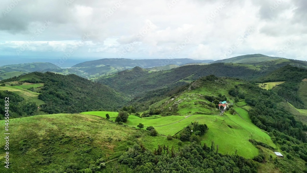 Obraz premium Enjoying Scenic Aerial Views of Lush Green Hills and Beautiful Landscapes to Explore